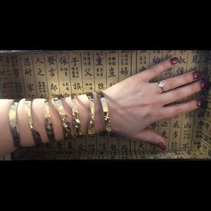 Pair of gold, hammered, full forearm cuffs